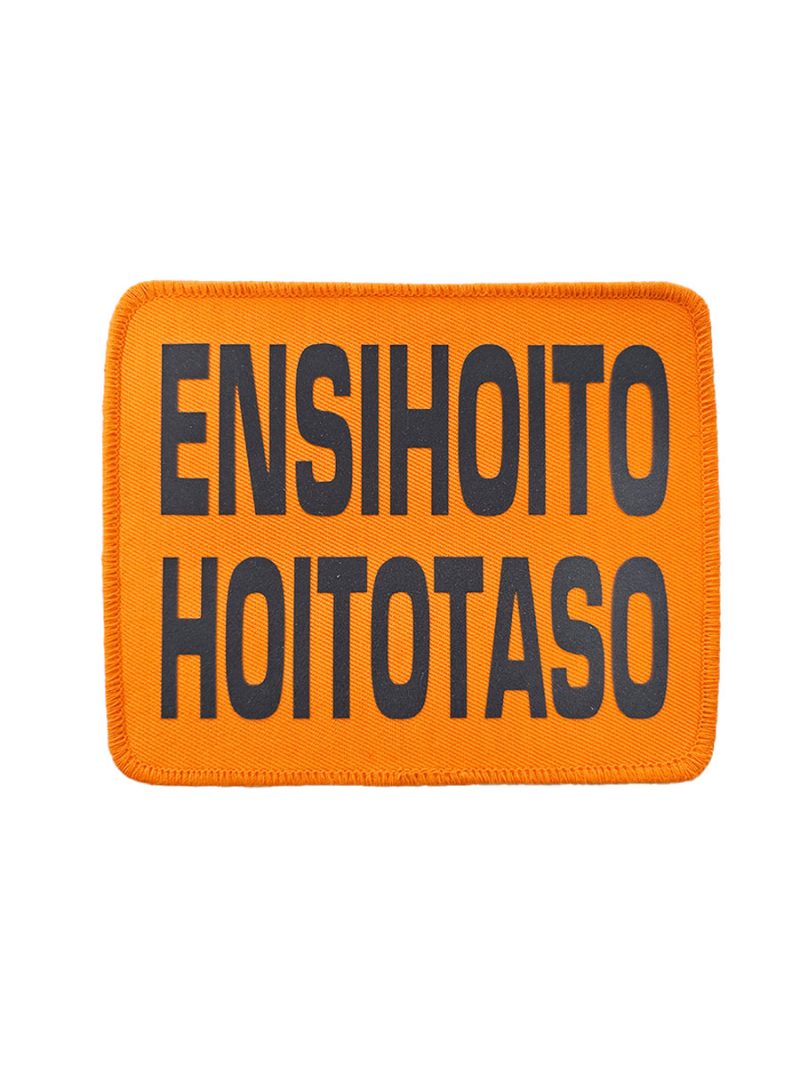 ENSIHOITO HOITOTASO rintamerkki, oranssi